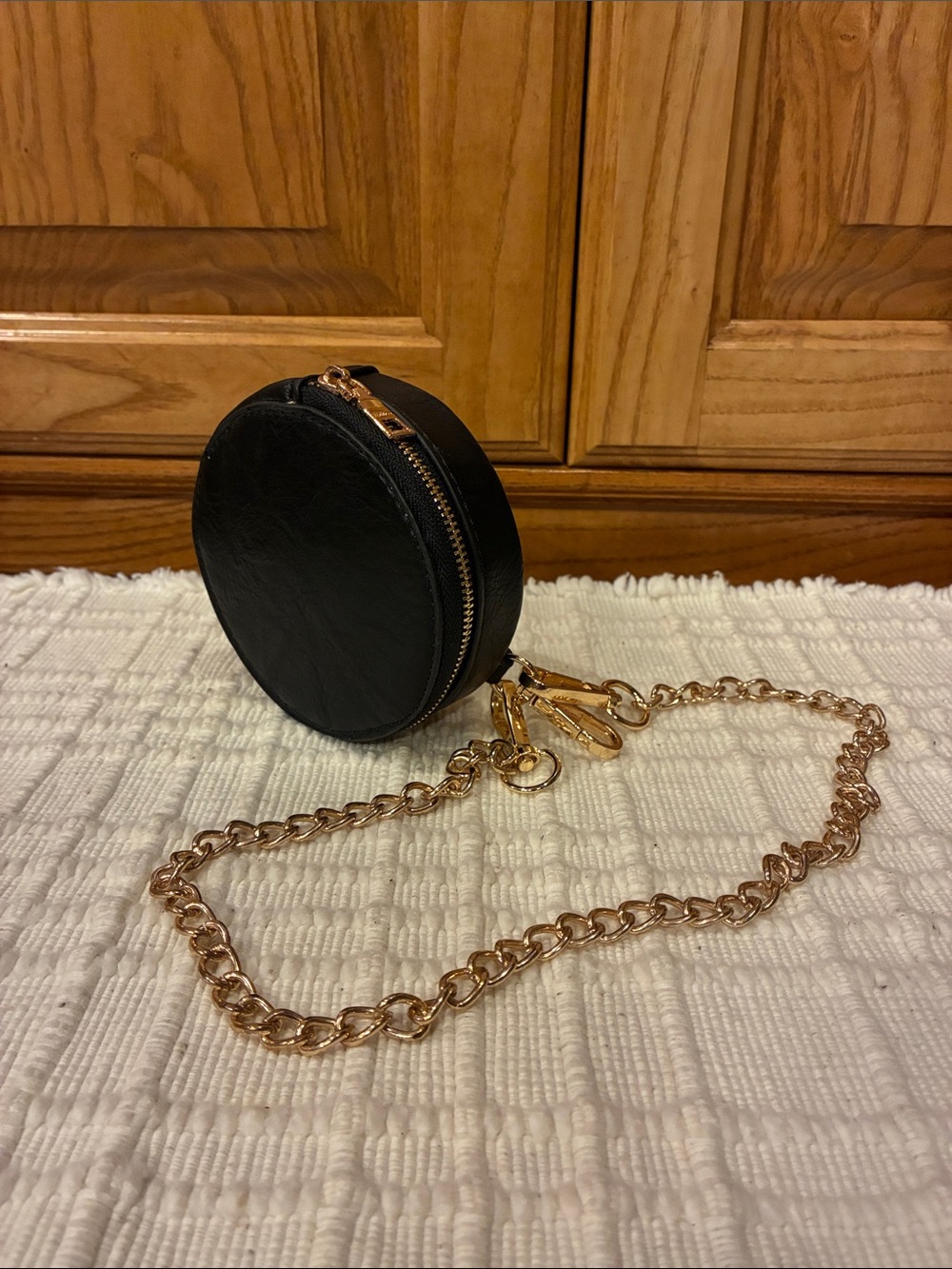 New Jen & Co Black Circular Zipper Coin Purse / Bag Charm with Gold Chain (ABBA)